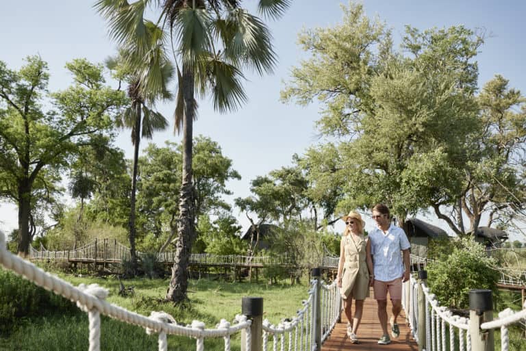 Wooden walkways at Baine's camp interconnect guest suites with main areas