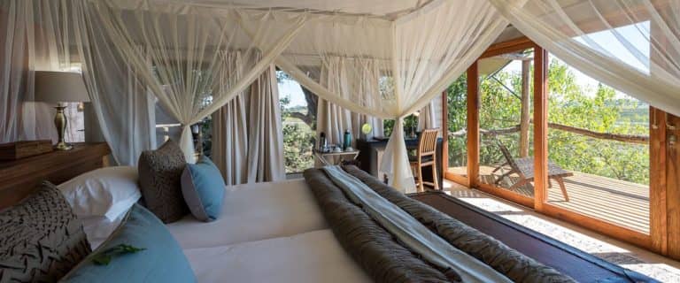 Guest tents in muted tones are light and airy at Tubu Tree Camp