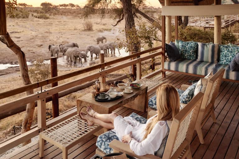 Savute Elephant Lodge guest put their feet up and relax after a full day on safari