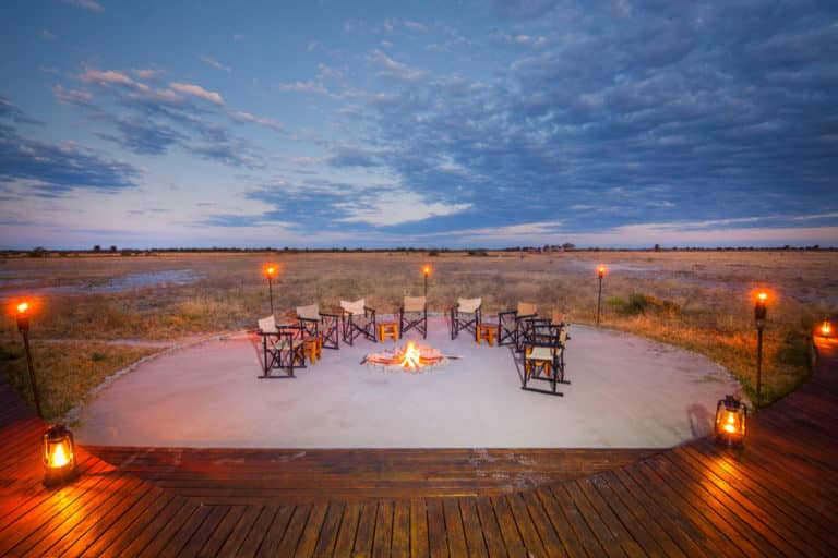 Evenings at Nxai Pan Camp begin and end around the camp fire