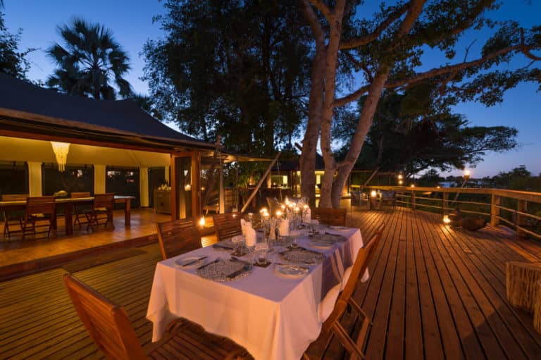 Dinner can be enjoyed on the main wooden deck at Pelo Camp