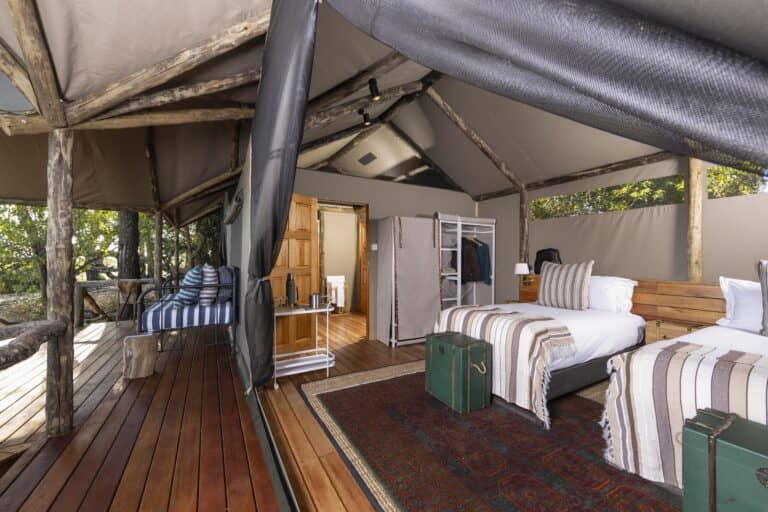 The Family tent at Shinde Footsteps features 2 bedrooms and a shared bathroom and viewing deck.