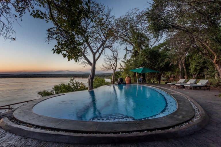 The River Clubs flow rim swimming pool overlooking the Zambezi River