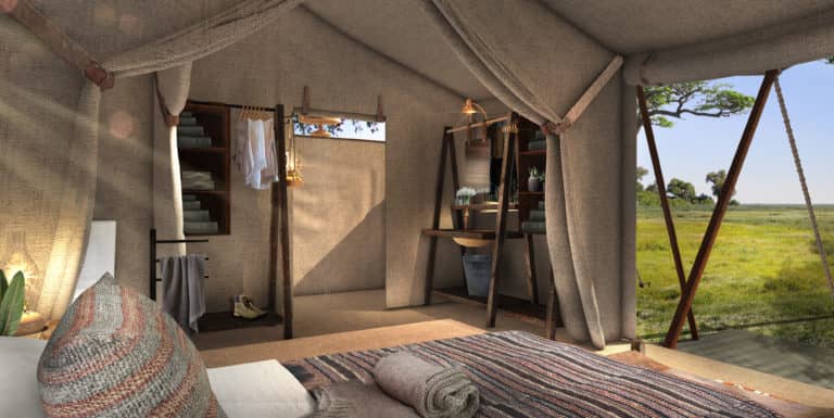 Complete interior view of tent with en suite bathroom facilities at Migration Expeditions