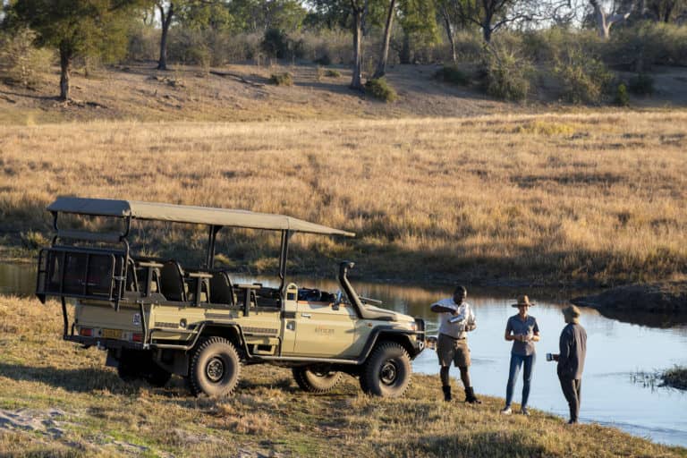 Sundowners at waterhole with Migration Expeditions Camp