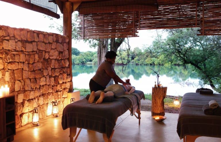 Guest indulging in a luxury bush massage at Matetsi River Lodge