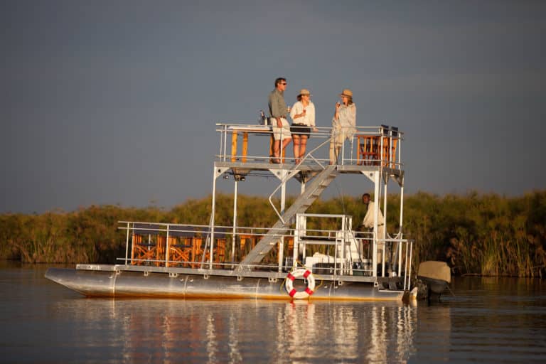 Barge excursion at Mopiri Camp offer an affordable Okavango Delta Safari experience