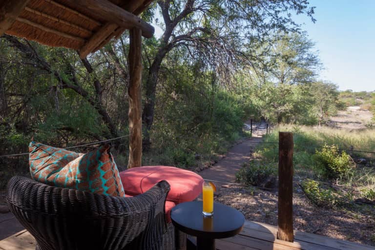 Mashatu tented Camp guest tent with bushveld view from private deck