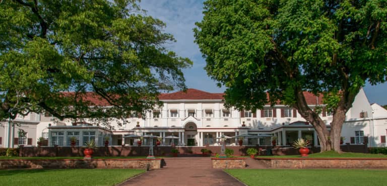 Front facade of the classic five star Victoria Falls Hotel