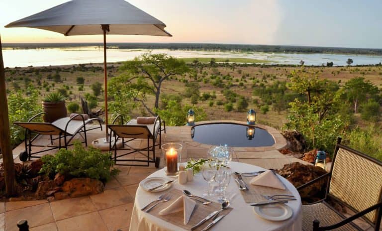 Ngoma Safari Lodge private room dinner set up with plunge pool view