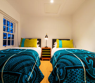 Children will enjoy their own comfortable twin beds in the Coach House at Fairview House