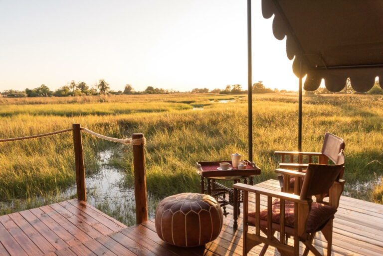 Each tented room at Duke's Camp has a private deck overlooking the okavango