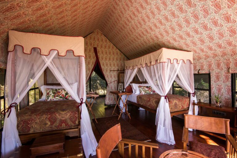 The twin bedded rooms at Duke's Camp feature four poster beds